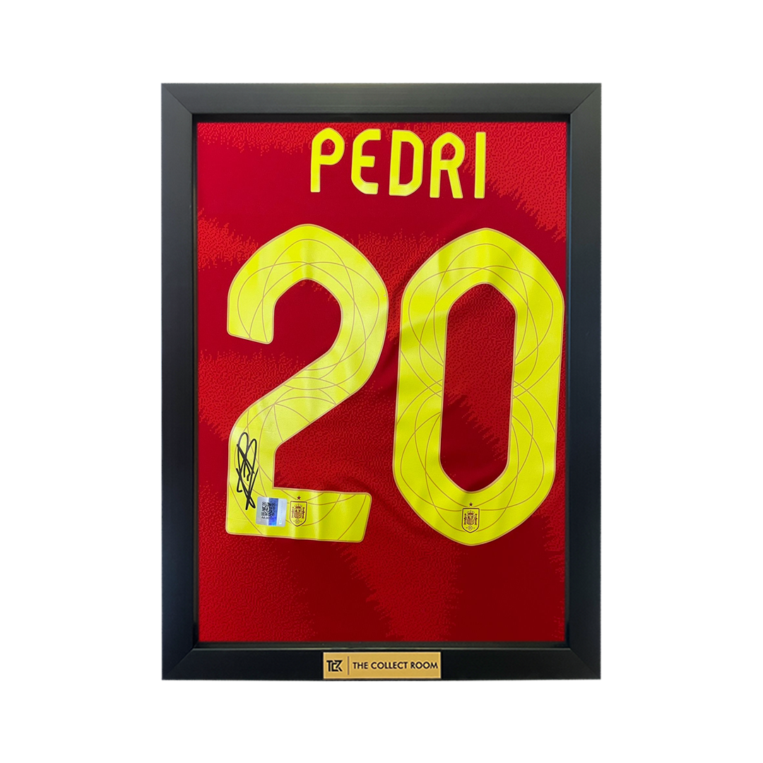 Pedri signed Spain home shirt